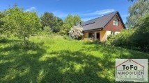Hauptbild ToFa: großes Grundstück mit Süd-West-Ausrichtung inkl. ELW-Doppelgarage